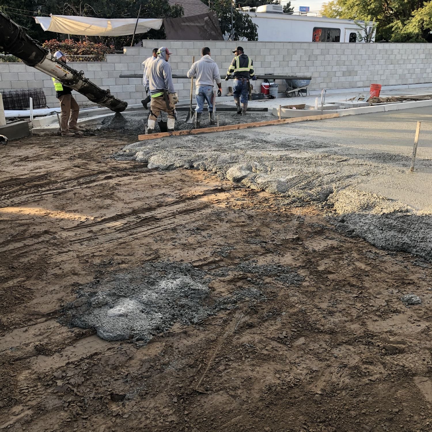 Crew placing concrete from the pump