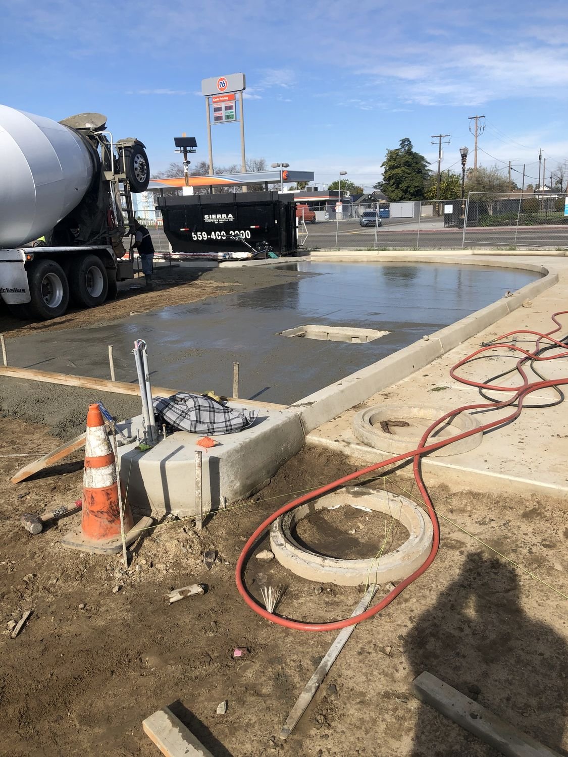 Forecourt slab being poured and finished