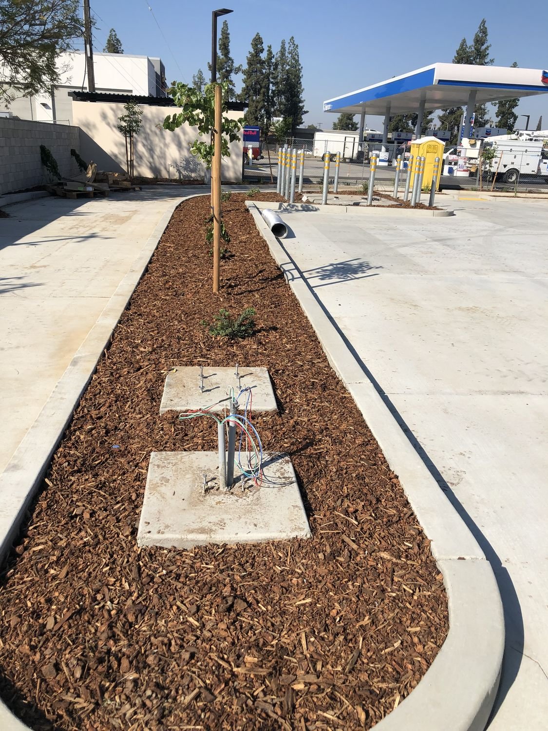 Landscape island and curbs finished on a forecourt