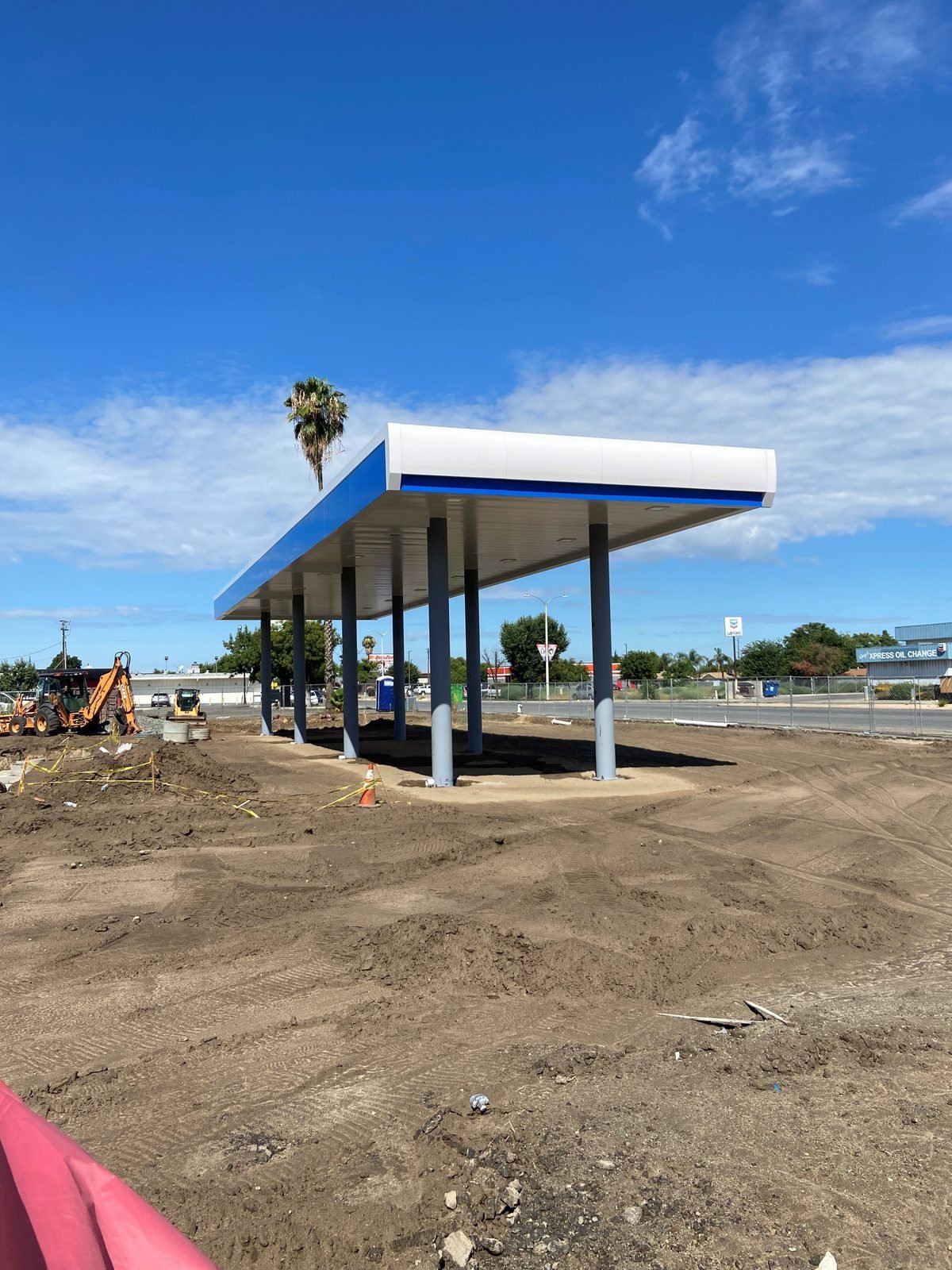 Completed canopy over a newly graded forecourt
