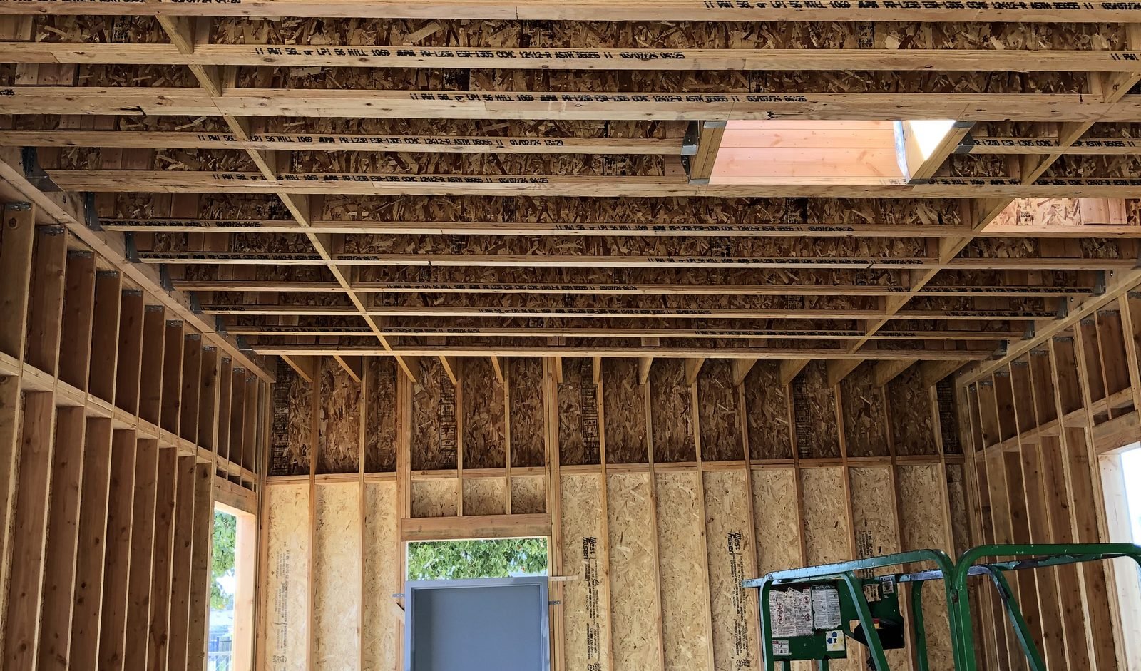 Interior framing and rough-in inside the new shell
