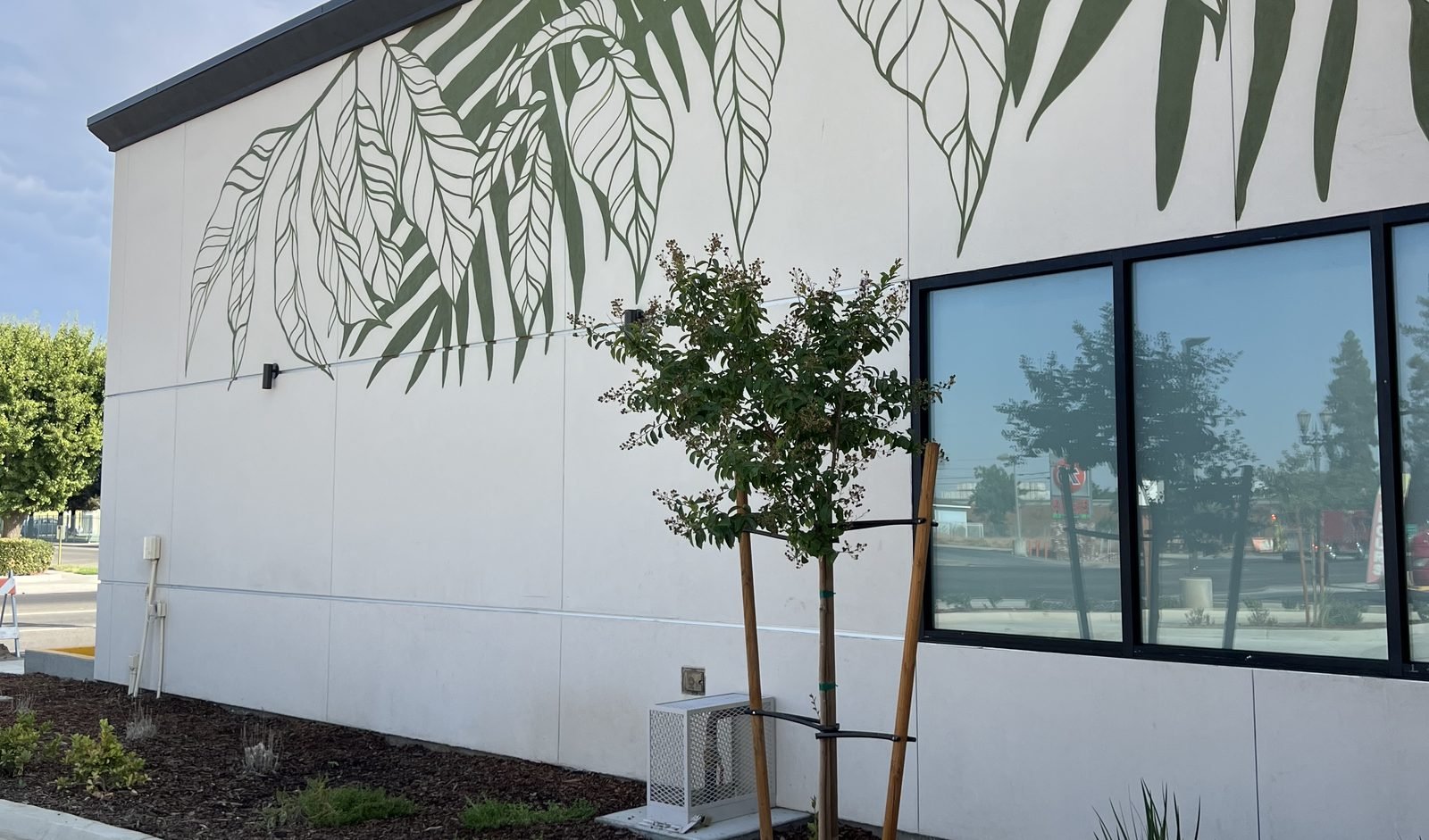 Finished stucco elevation with feature artwork