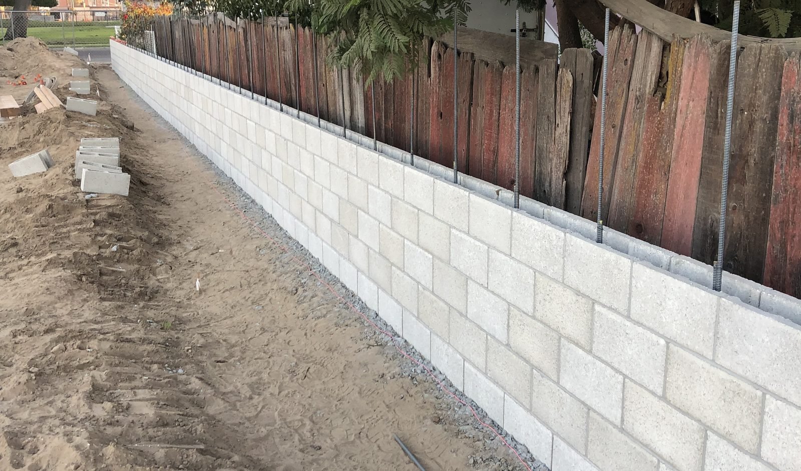 Block retaining wall built along the site perimeter